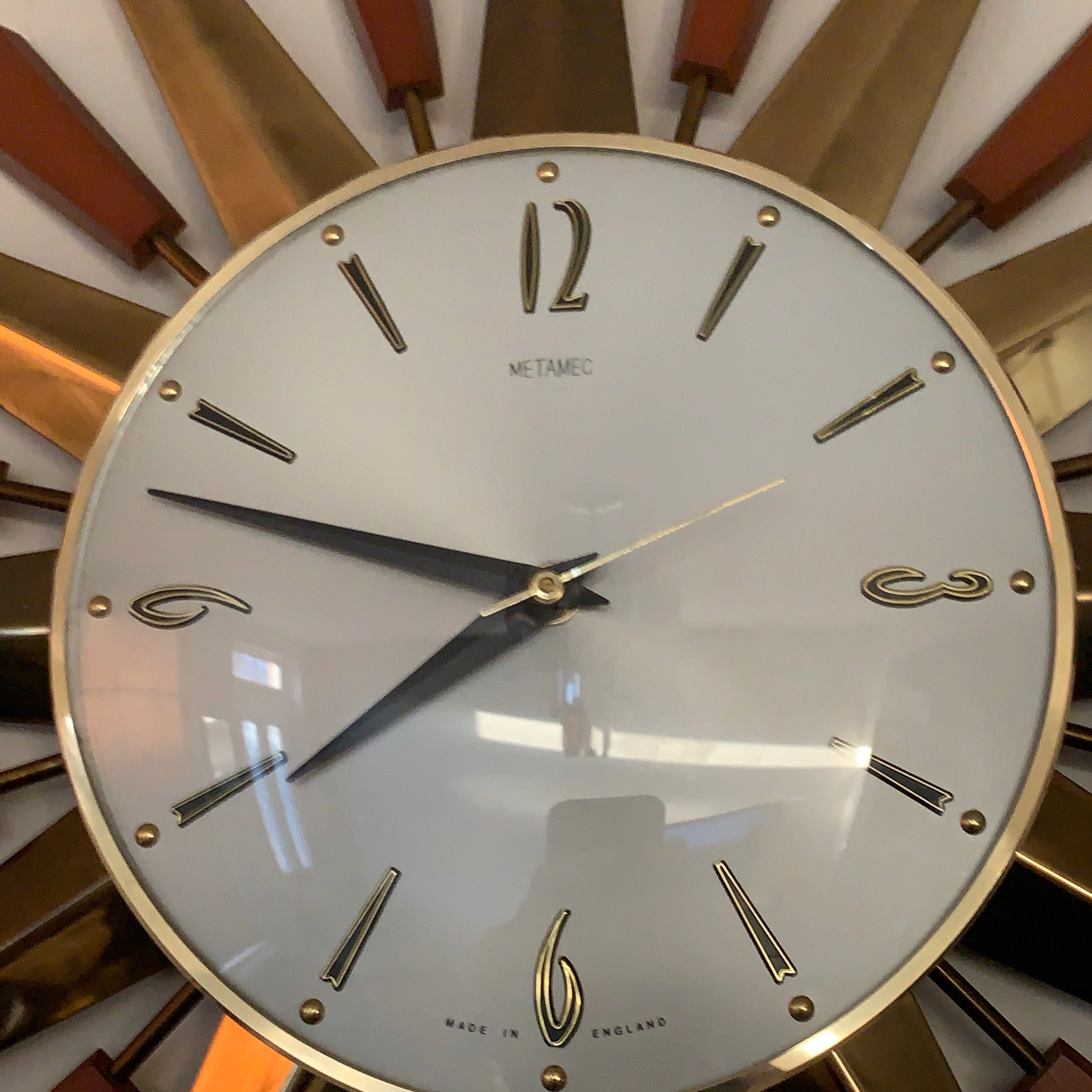 Metamec 5629 Starburst Wall Clock — Teak & Brass, Original Hands, 1960s