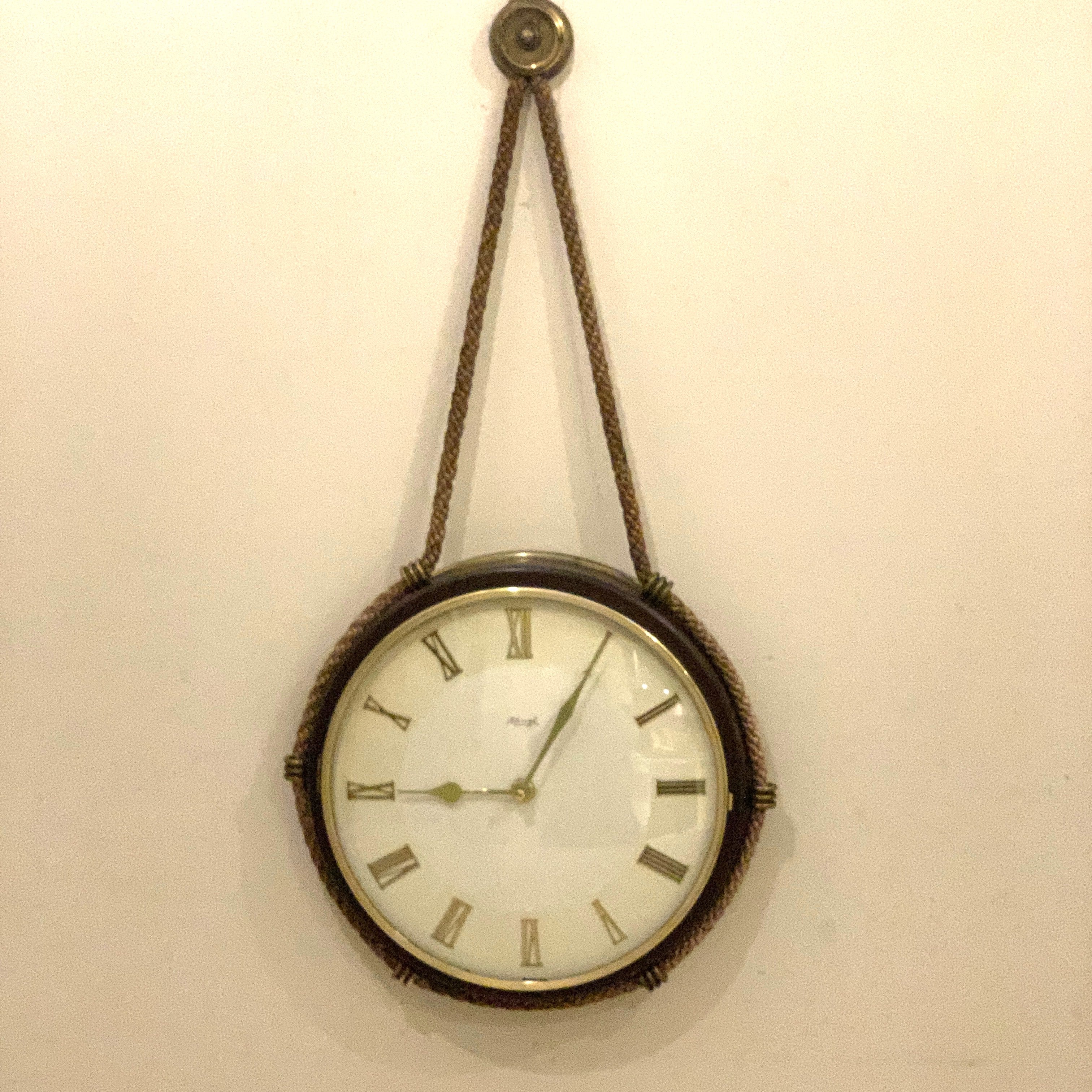 Kienzle Rope Hung Wall Clock: 1960s Brass Bezel, Roman Numerals, White Dial