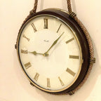 Kienzle Rope Hung Wall Clock: 1960s Brass Bezel, Roman Numerals, White Dial