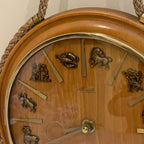 Kienzle Zodiac Wall Clock: Rope Hung Wooden Case, Brass Symbols, Mid Century 1960s Quartz