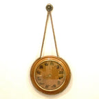 Kienzle Zodiac Wall Clock: Rope Hung Wooden Case, Brass Symbols, Mid Century 1960s Quartz