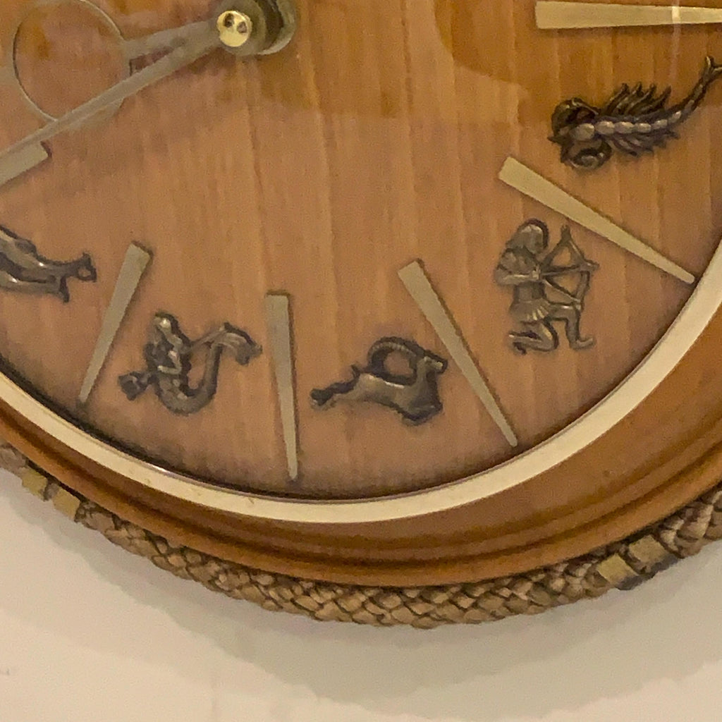 Kienzle Zodiac Wall Clock: Rope Hung Wooden Case, Brass Symbols, Mid Century 1960s Quartz