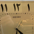 Seiko QAF066F Wall Clock – Eastern Arabic Numerals, Brass & Acrylic, 11 Inch