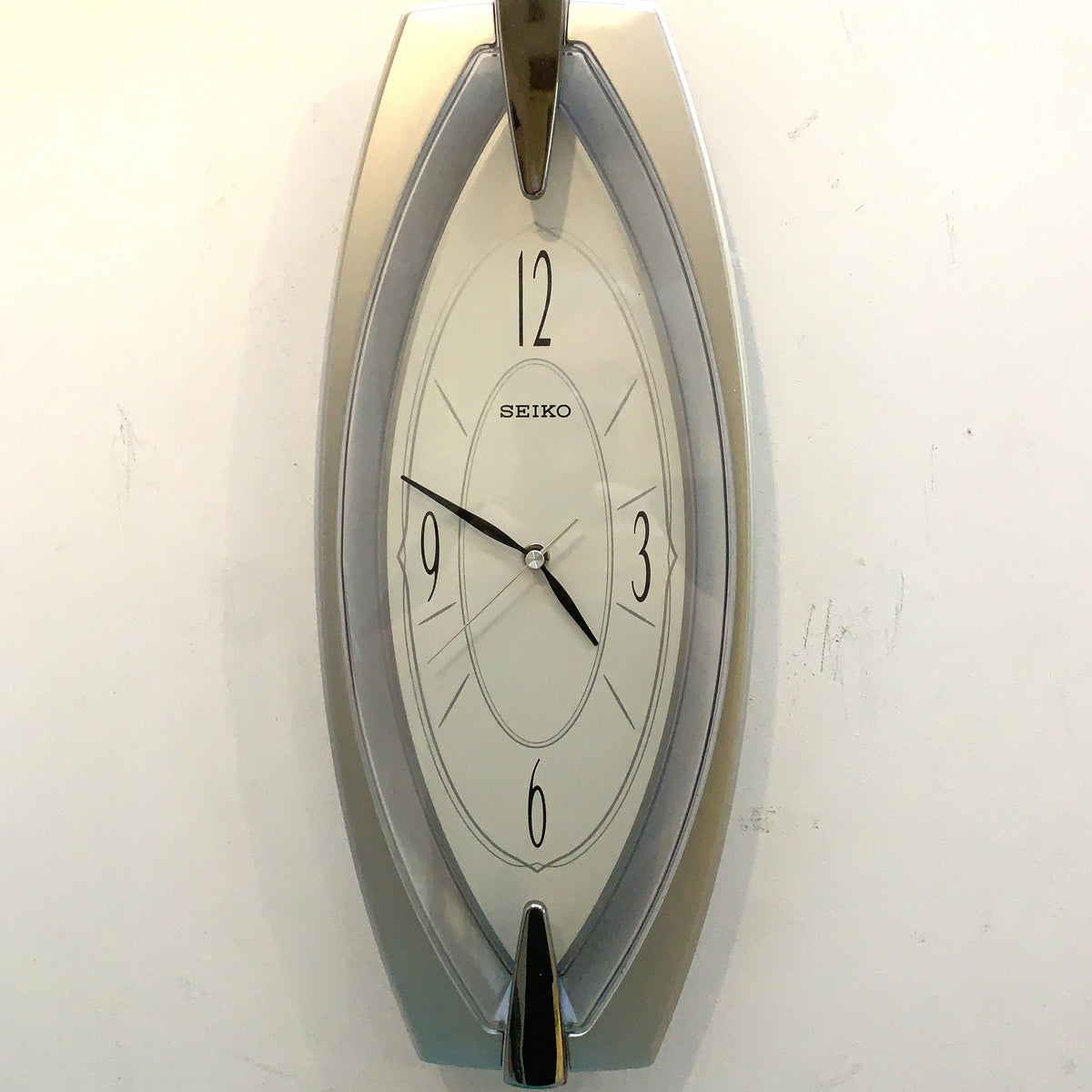 Seiko QXA342S Elongated Silver Wall Clock, NOS Unused, Quiet Sweep Quartz, Modern Japanese Design