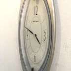 Seiko QXA342S Elongated Silver Wall Clock, NOS Unused, Quiet Sweep Quartz, Modern Japanese Design