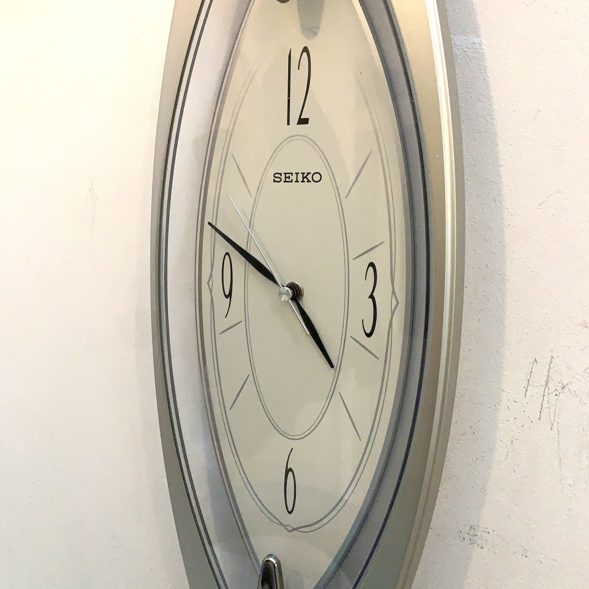 Seiko QXA342S Elongated Silver Wall Clock, NOS Unused, Quiet Sweep Quartz, Modern Japanese Design
