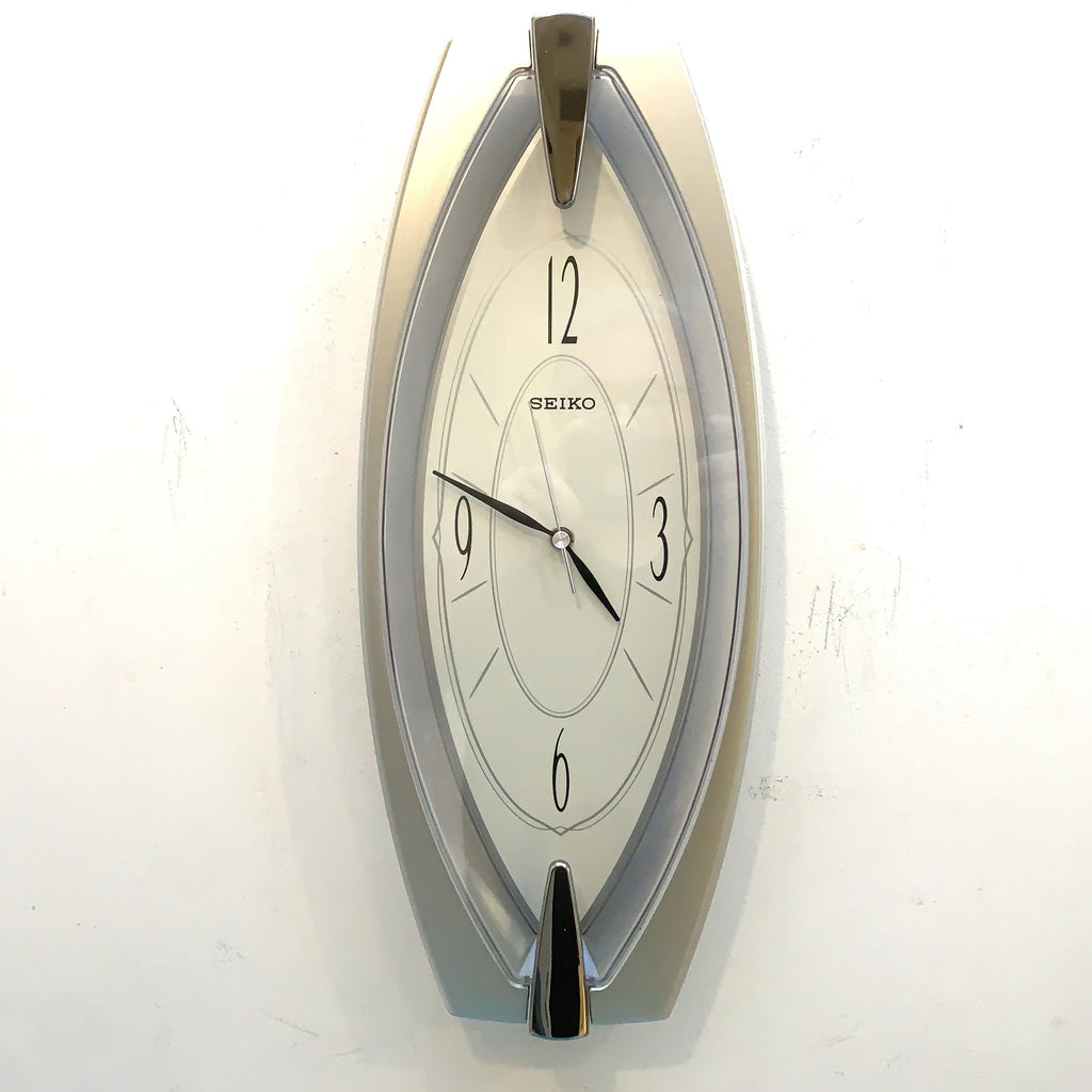 Seiko QXA342S Elongated Silver Wall Clock, NOS Unused, Quiet Sweep Quartz, Modern Japanese Design