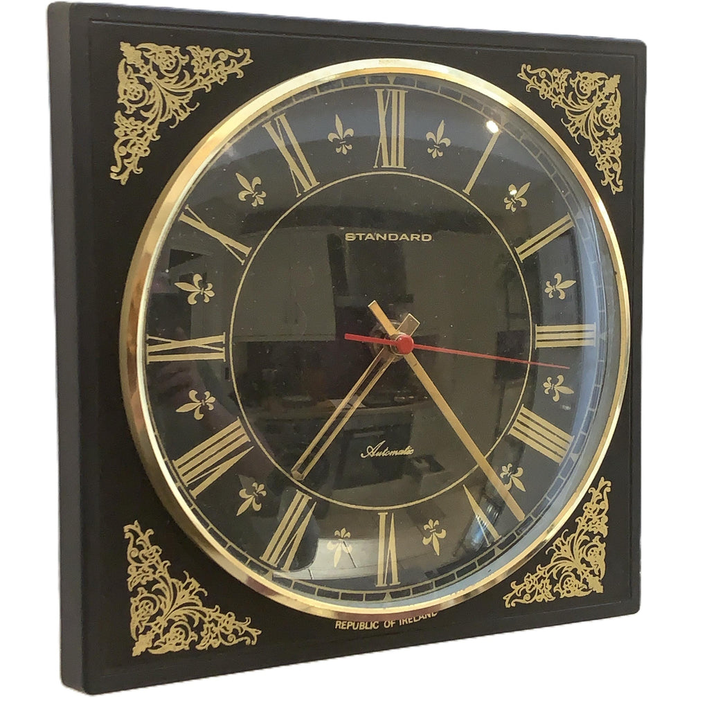 Standard Automatic Wall Clock – Irish Made, Black & Gold Fleur de Lis, 1960s