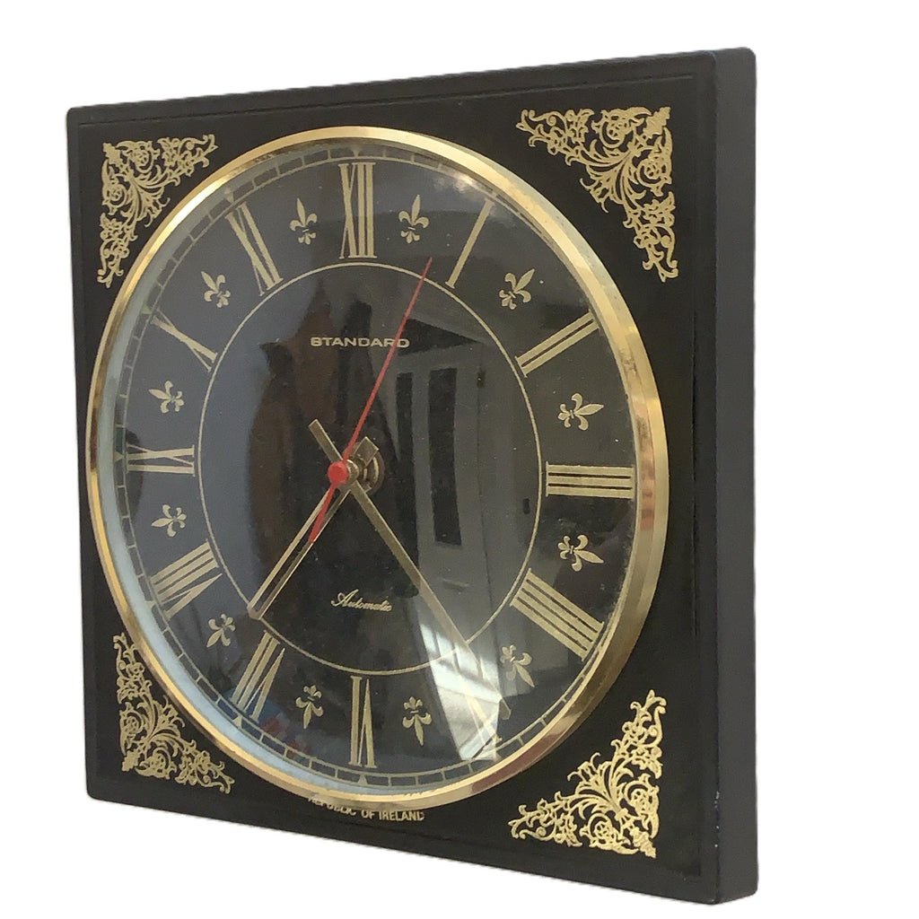 Standard Automatic Wall Clock – Irish Made, Black & Gold Fleur de Lis, 1960s