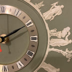 Wedgwood jasperware wall clock, 1970s sage green, neoclassical white relief figures