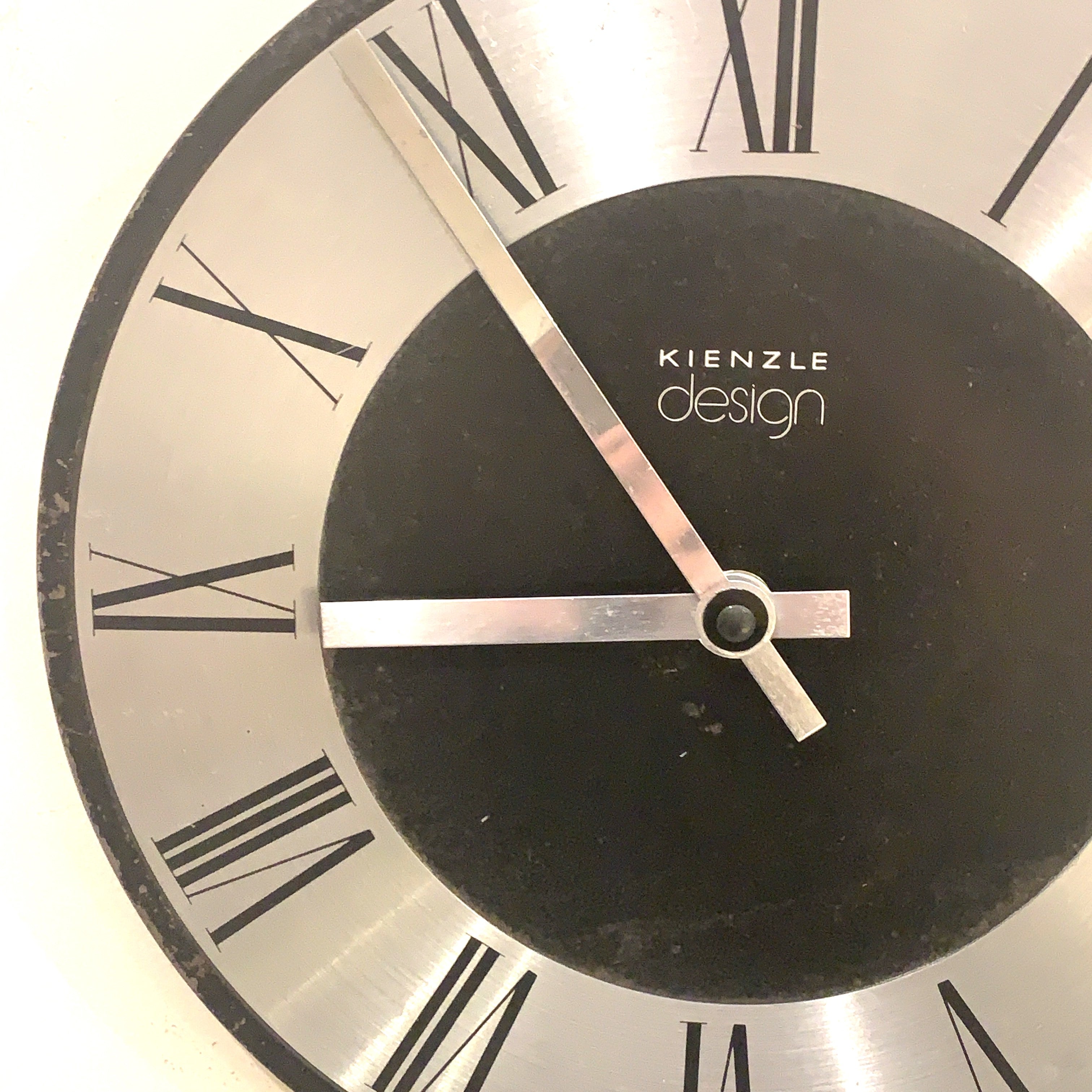 Kienzle Design Wall Clock Germany Brushed Aluminium Black Dial Roman Numerals 1970s Quartz
