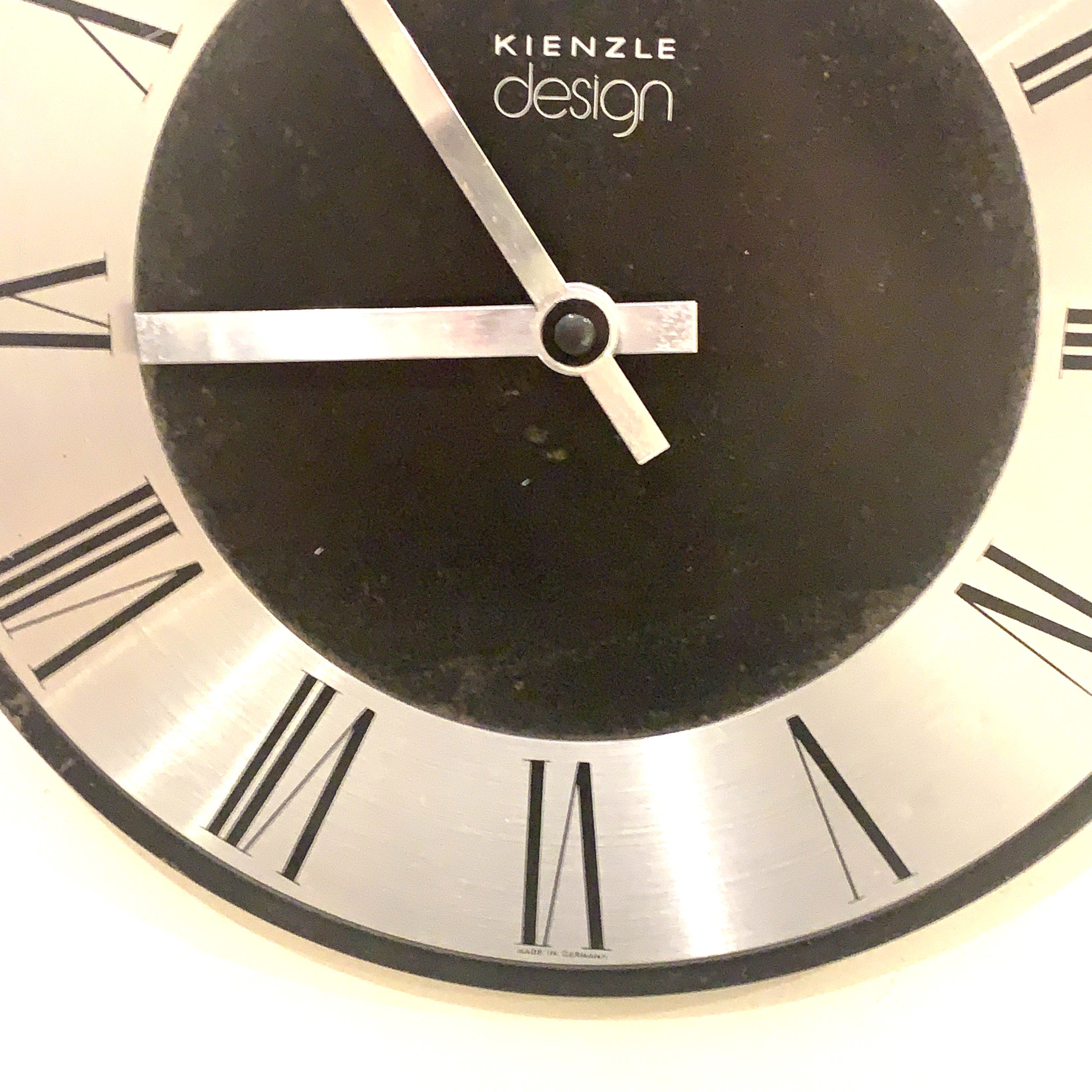 Kienzle Design Wall Clock Germany Brushed Aluminium Black Dial Roman Numerals 1970s Quartz