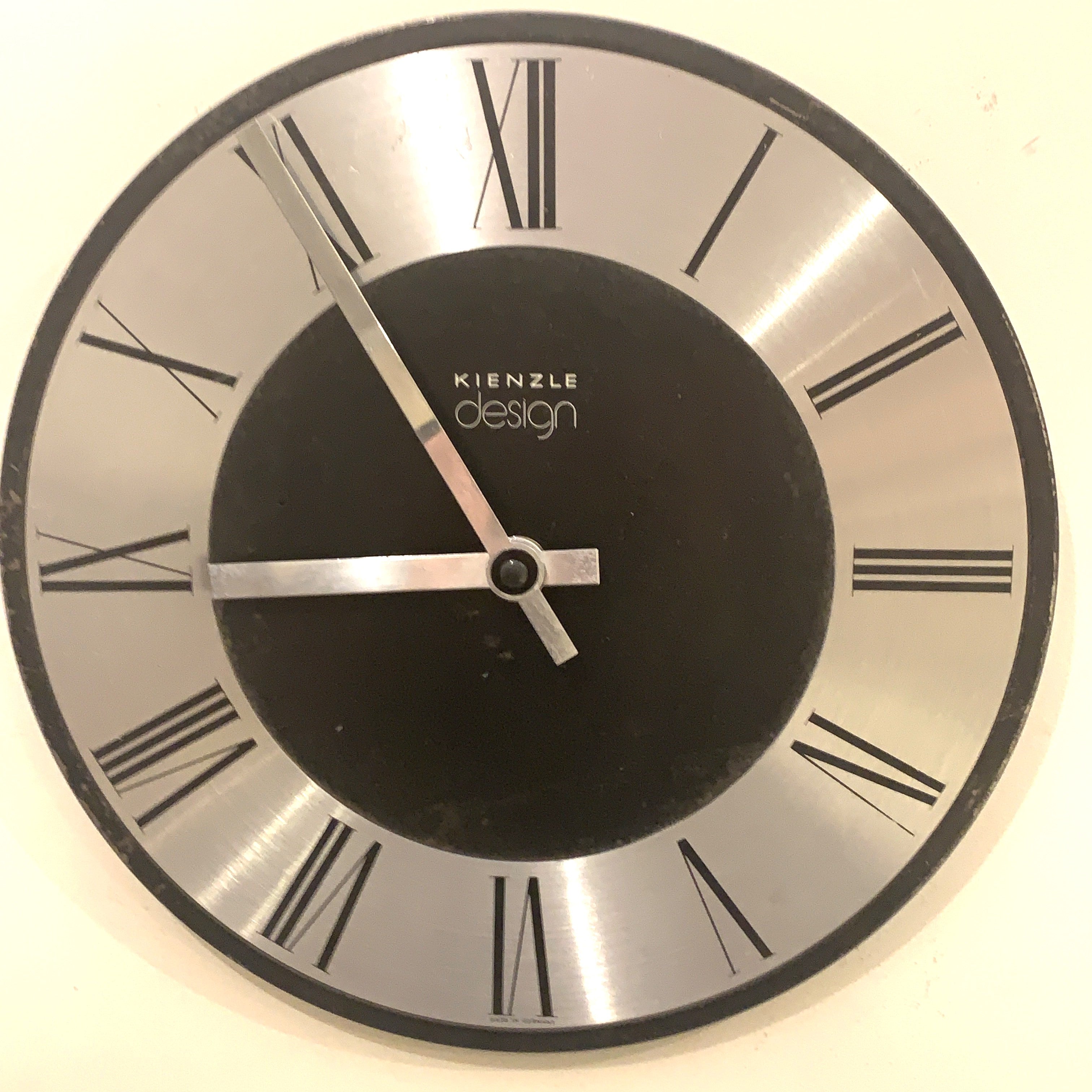 Kienzle Design Wall Clock Germany Brushed Aluminium Black Dial Roman Numerals 1970s Quartz