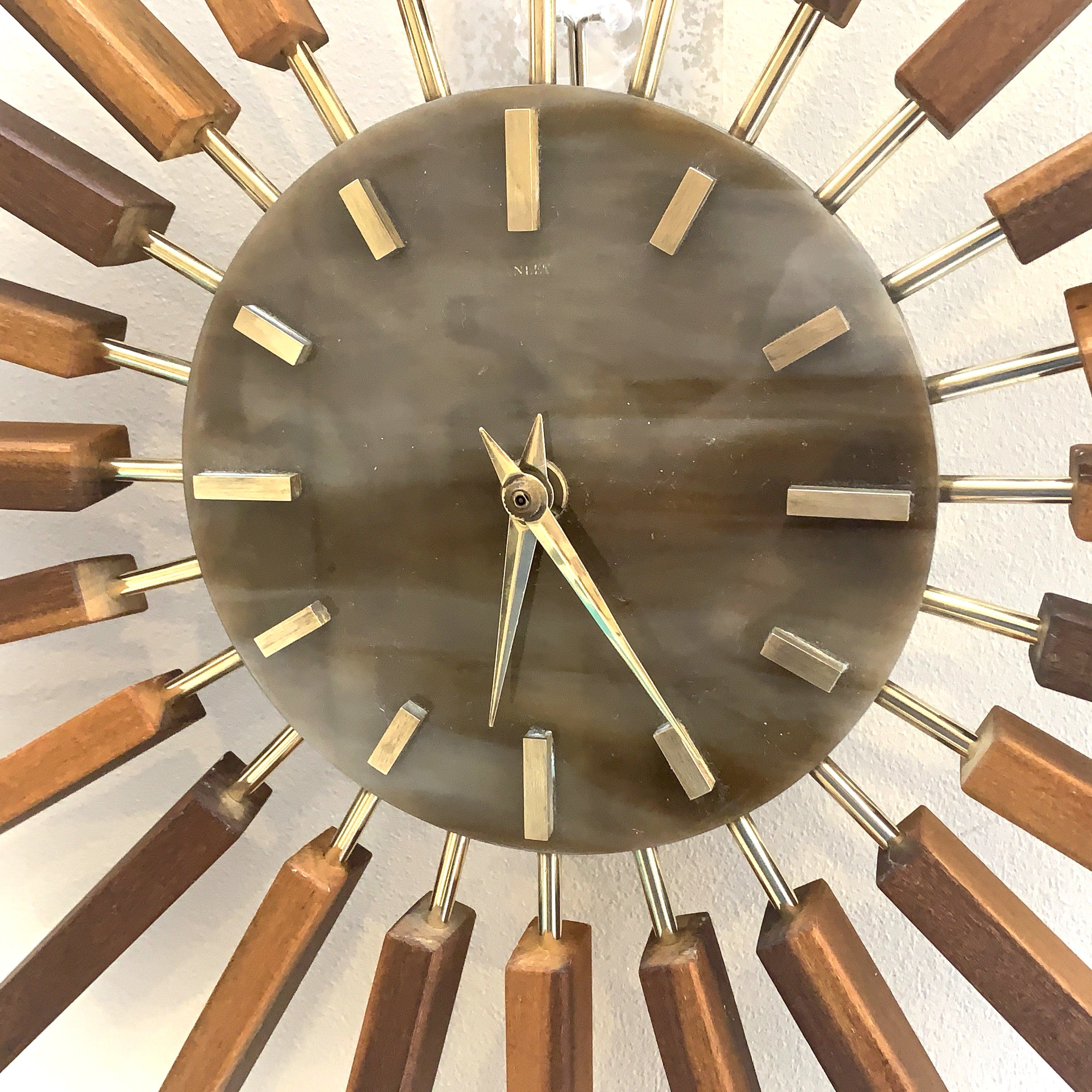 1960s Manley Teak Walnut Starburst Clock, 24 Spoke Atomic Design