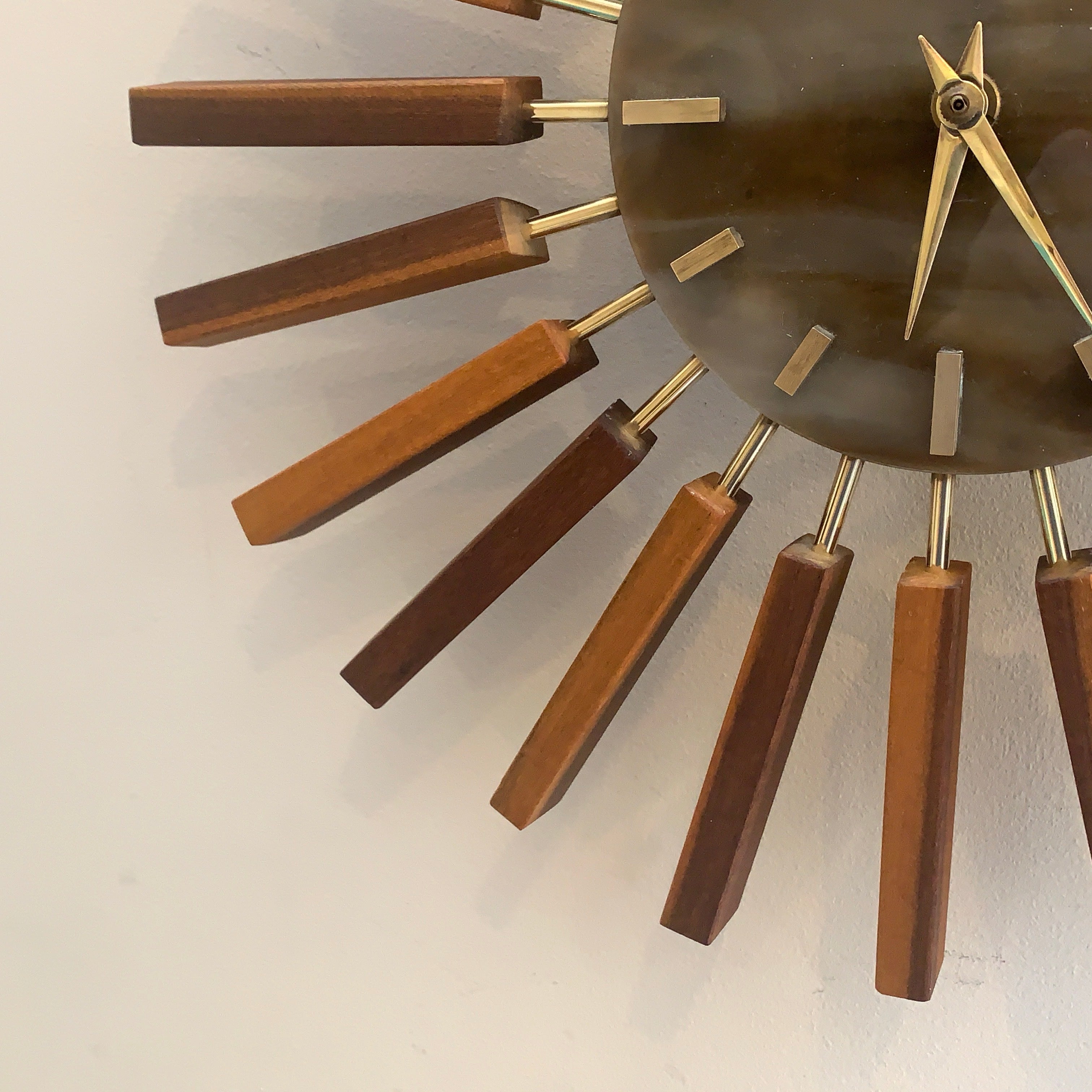 1960s Manley Teak Walnut Starburst Clock, 24 Spoke Atomic Design