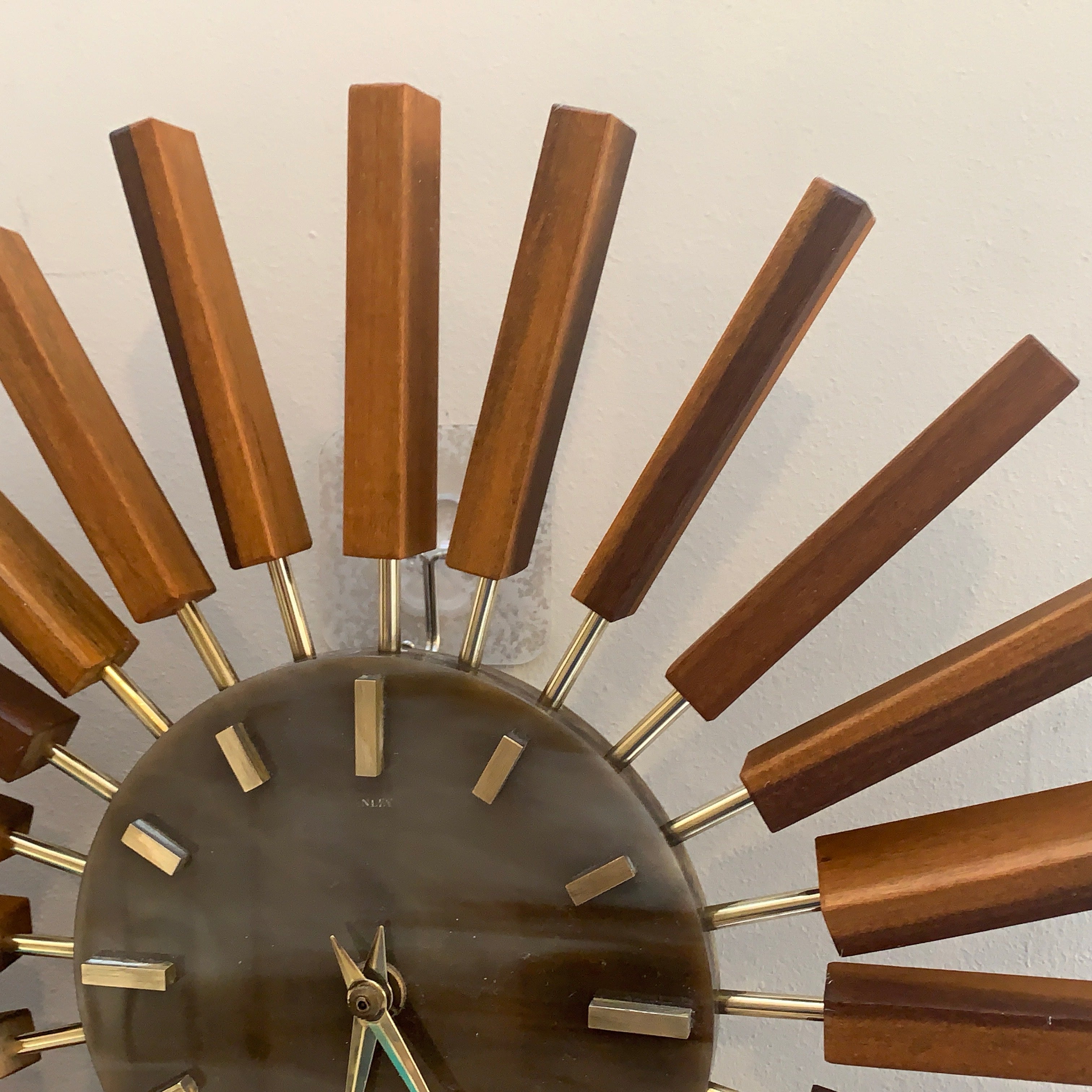 1960s Manley Teak Walnut Starburst Clock, 24 Spoke Atomic Design