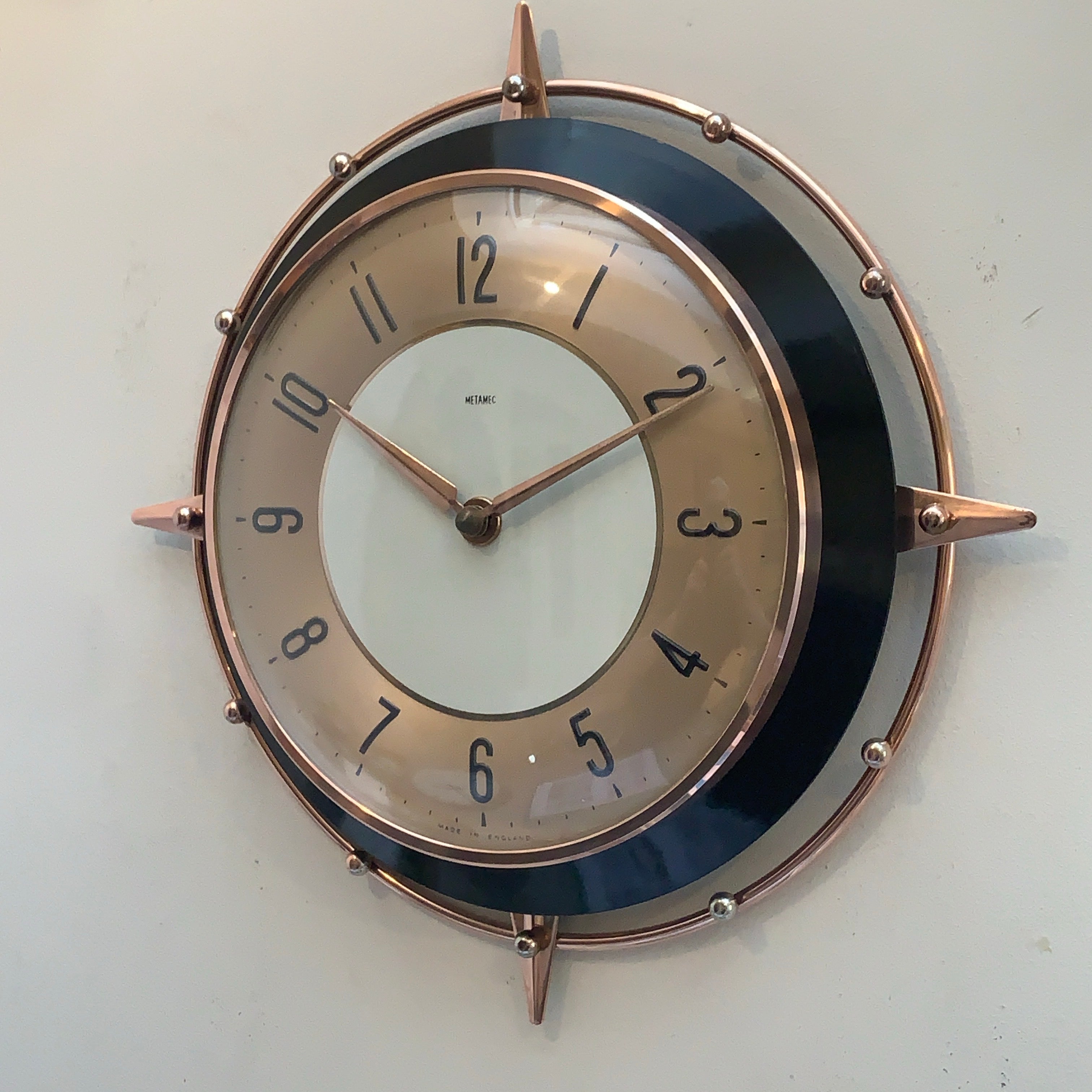 Metamec 5859 Starburst Wall Clock — Copper & Black Bakelite, 1960s, Kienzle Quartz