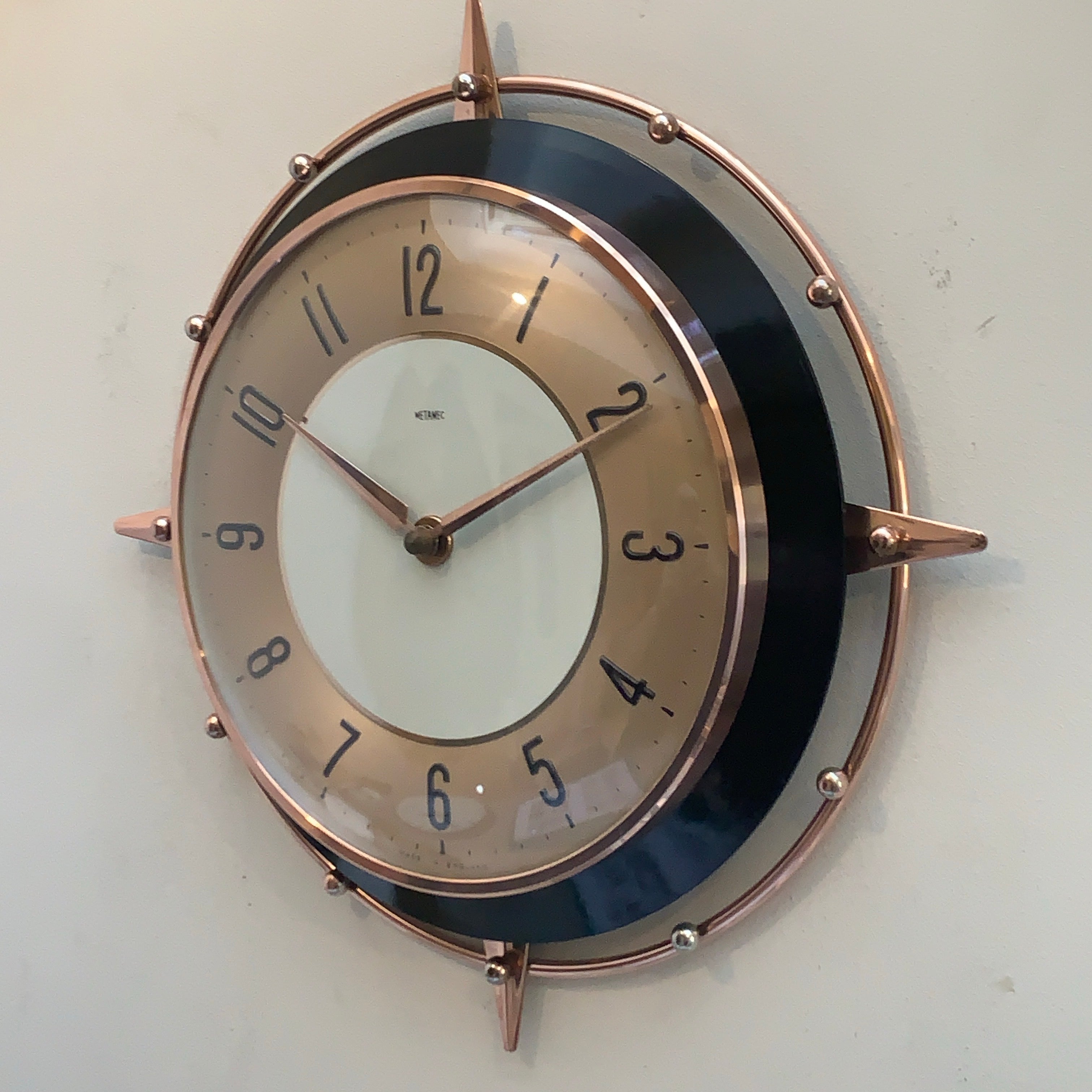 Metamec 5859 Starburst Wall Clock — Copper & Black Bakelite, 1960s, Kienzle Quartz