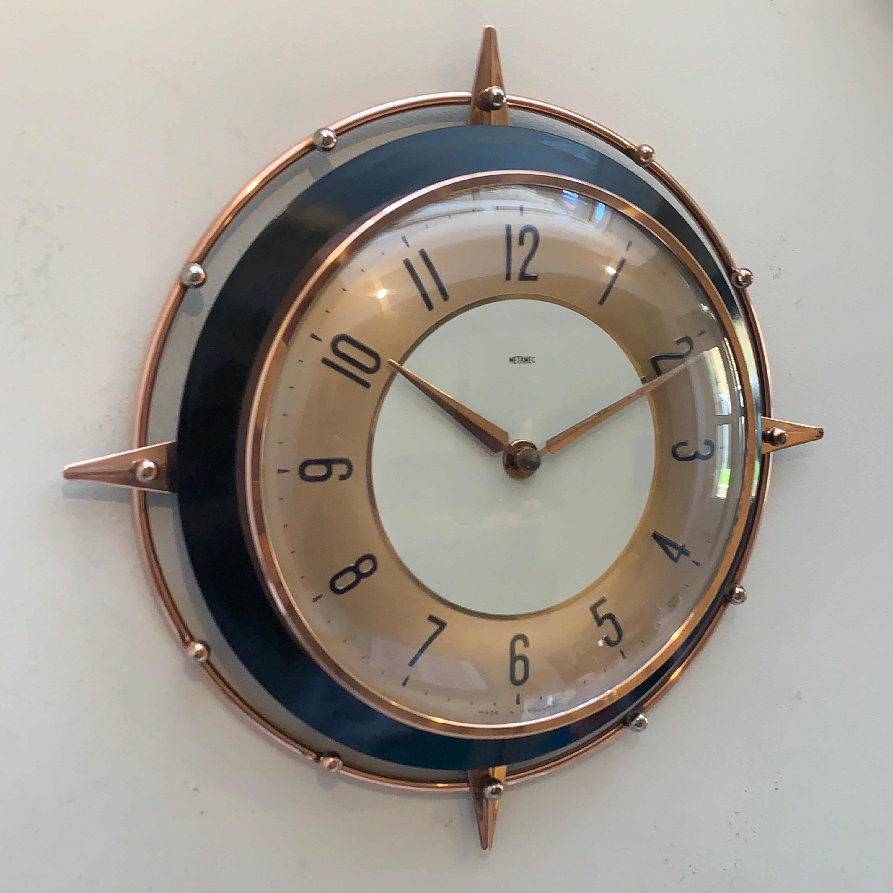 Metamec 5859 Starburst Wall Clock — Copper & Black Bakelite, 1960s, Kienzle Quartz