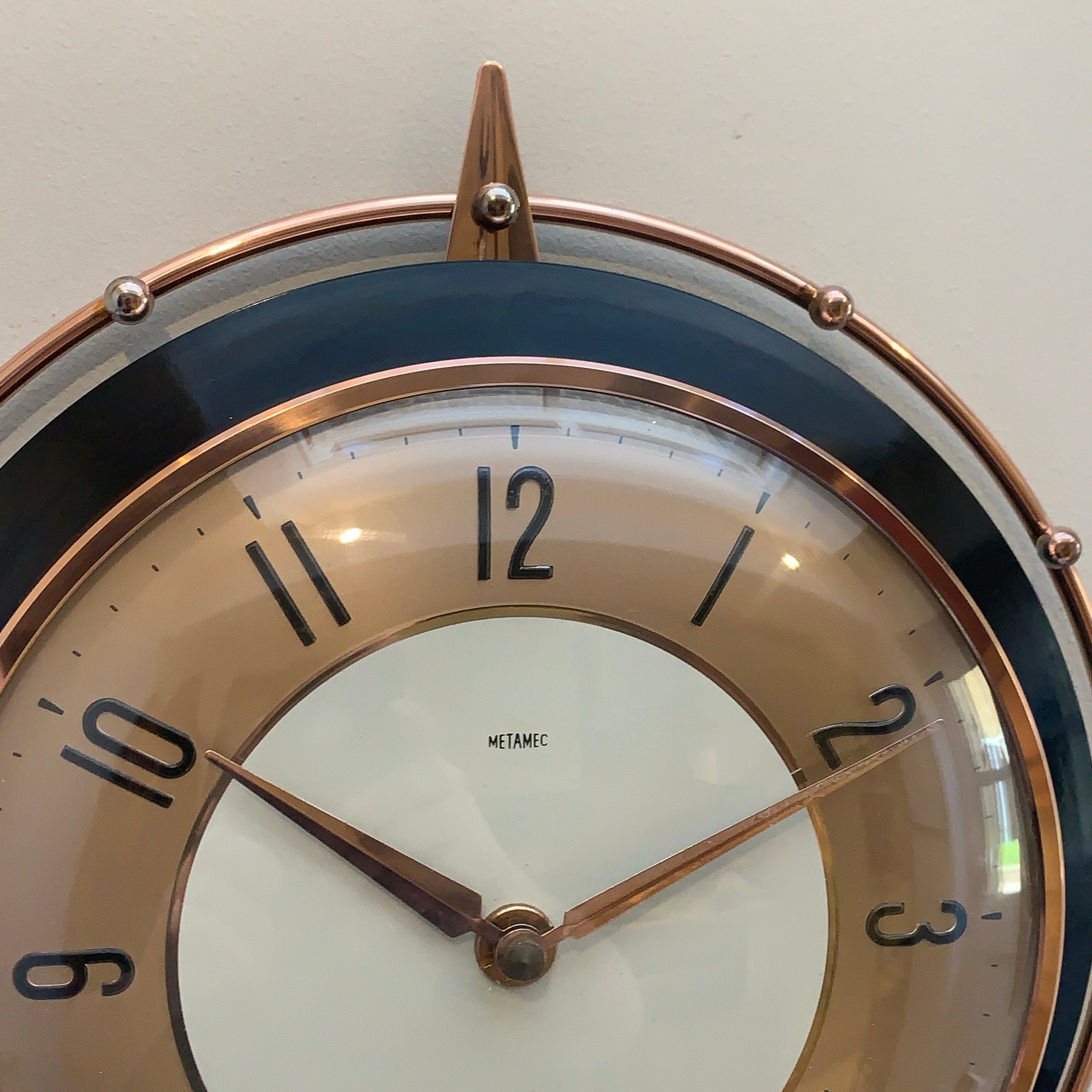 Metamec 5859 Starburst Wall Clock — Copper & Black Bakelite, 1960s, Kienzle Quartz