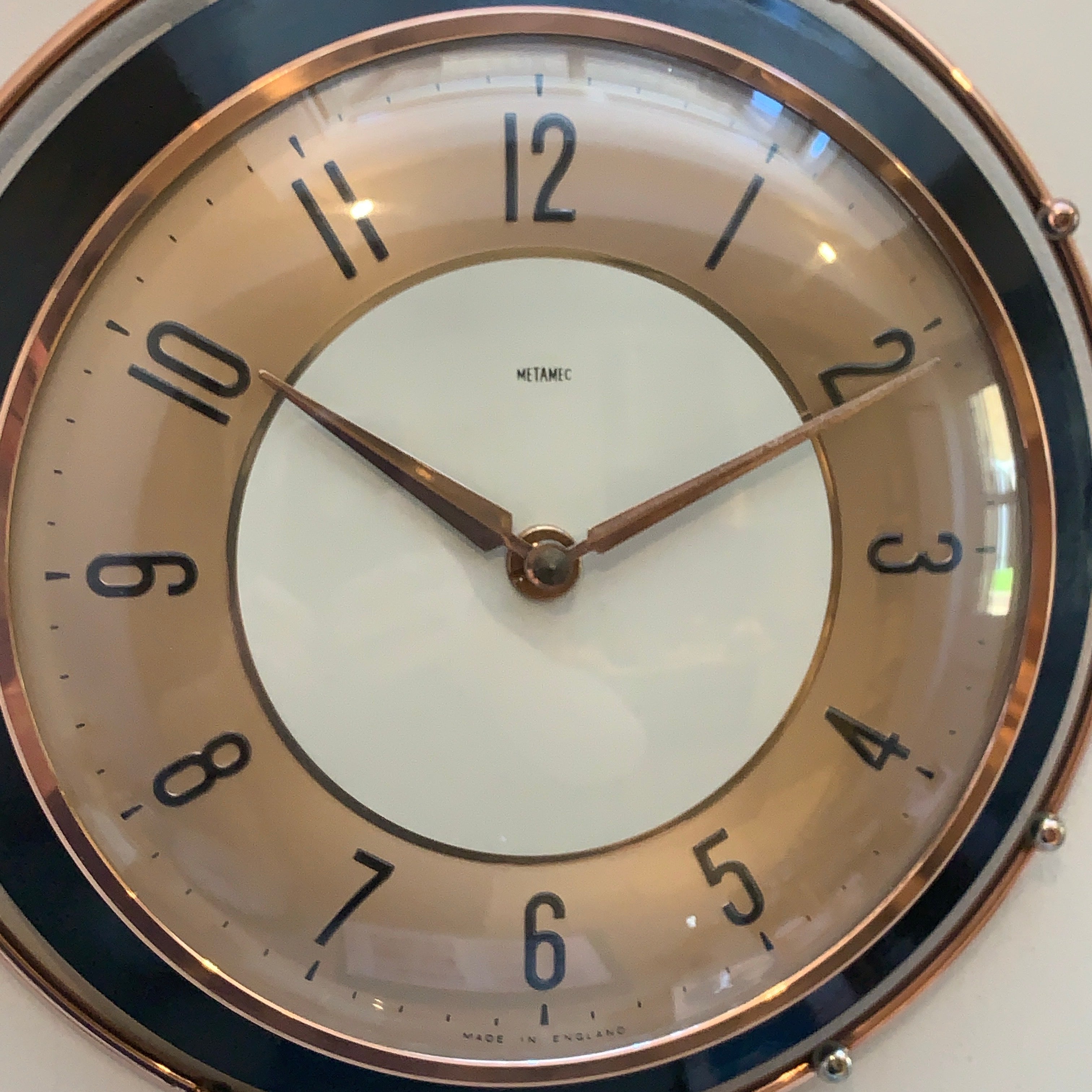 Metamec 5859 Starburst Wall Clock — Copper & Black Bakelite, 1960s, Kienzle Quartz