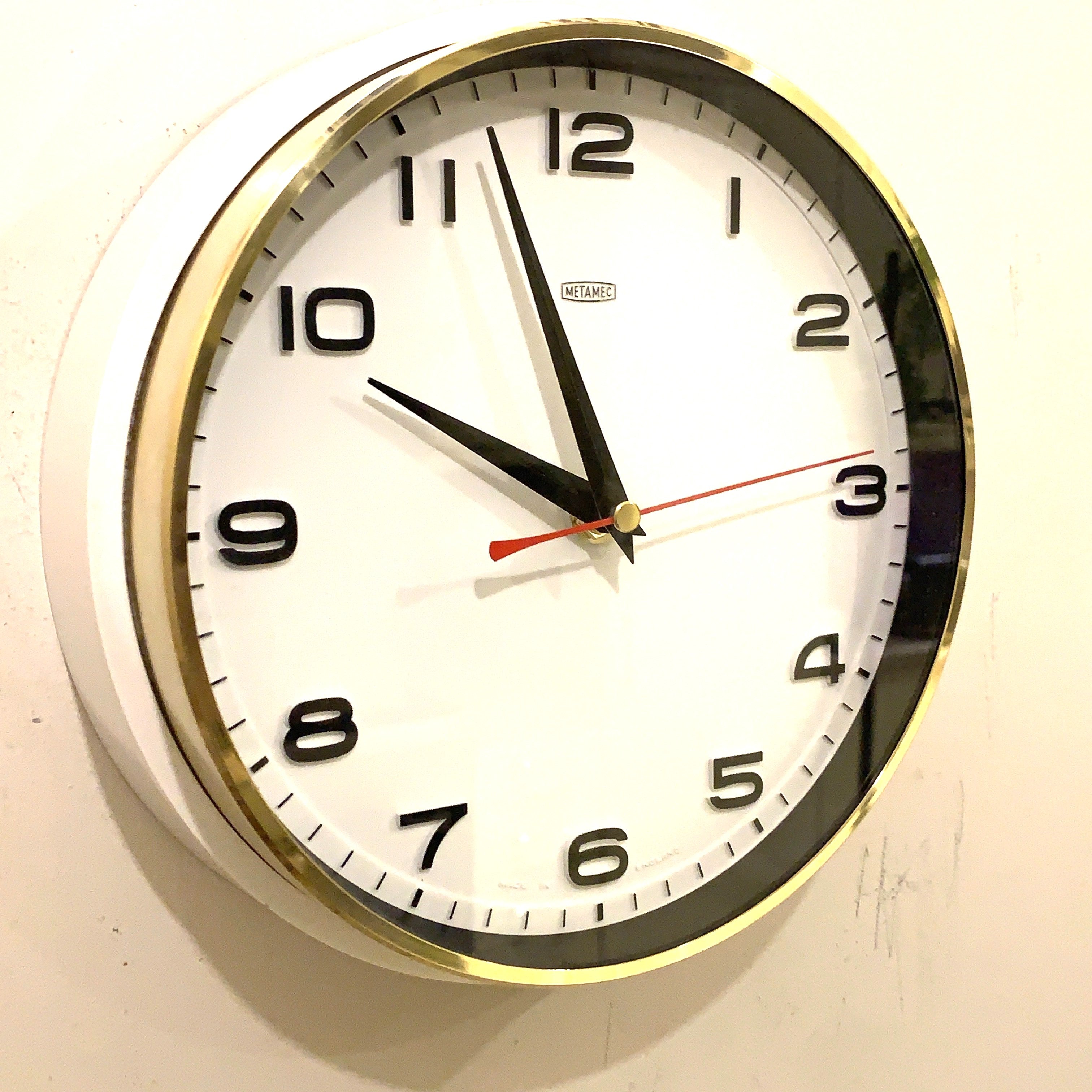 Metamec 5601 Wall Clock — White Bakelite, Solid Brass Bezel, 1960s