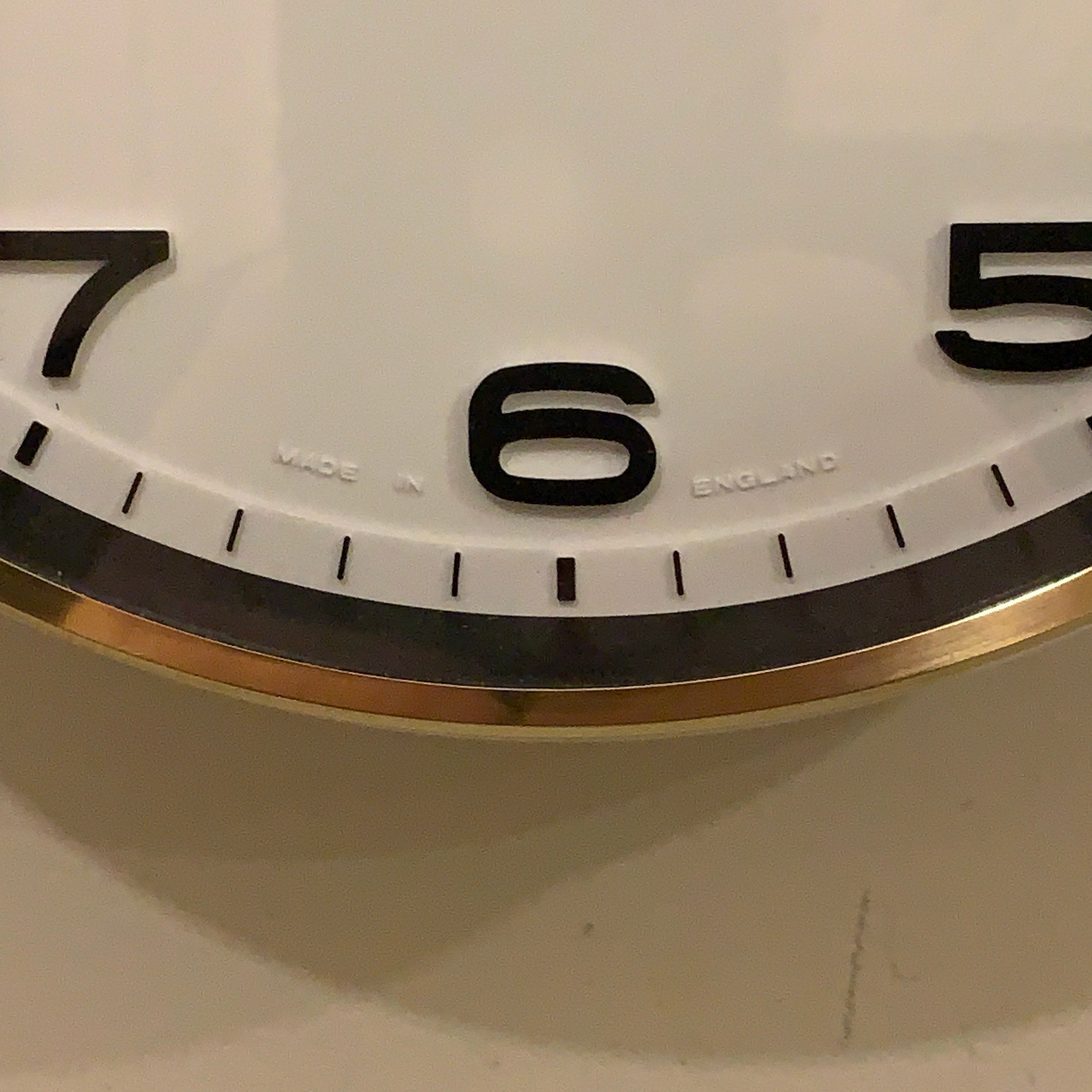 Metamec 5601 Wall Clock — White Bakelite, Solid Brass Bezel, 1960s